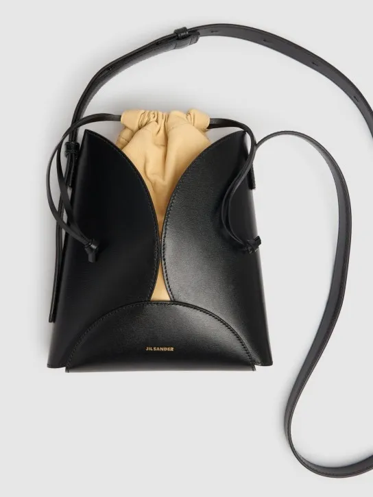 Jil Sander   Ellipse palmellato leather crossbody bag 